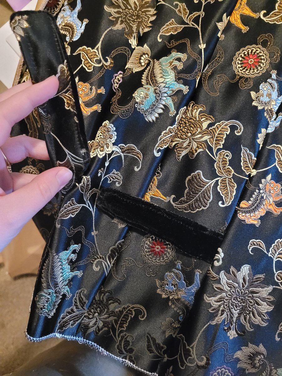 olive_schmolive's tweet photo. I'm really proud of how it's turning out so far! I patterned it myself based on the fitted bodice sloper I made a while back -- modified to better fit a more masc chest shape and...well, make it into a vest, lol. I like the lil strap on the back, tucked into the dart seams! https://t.co/OIXuDs84kX