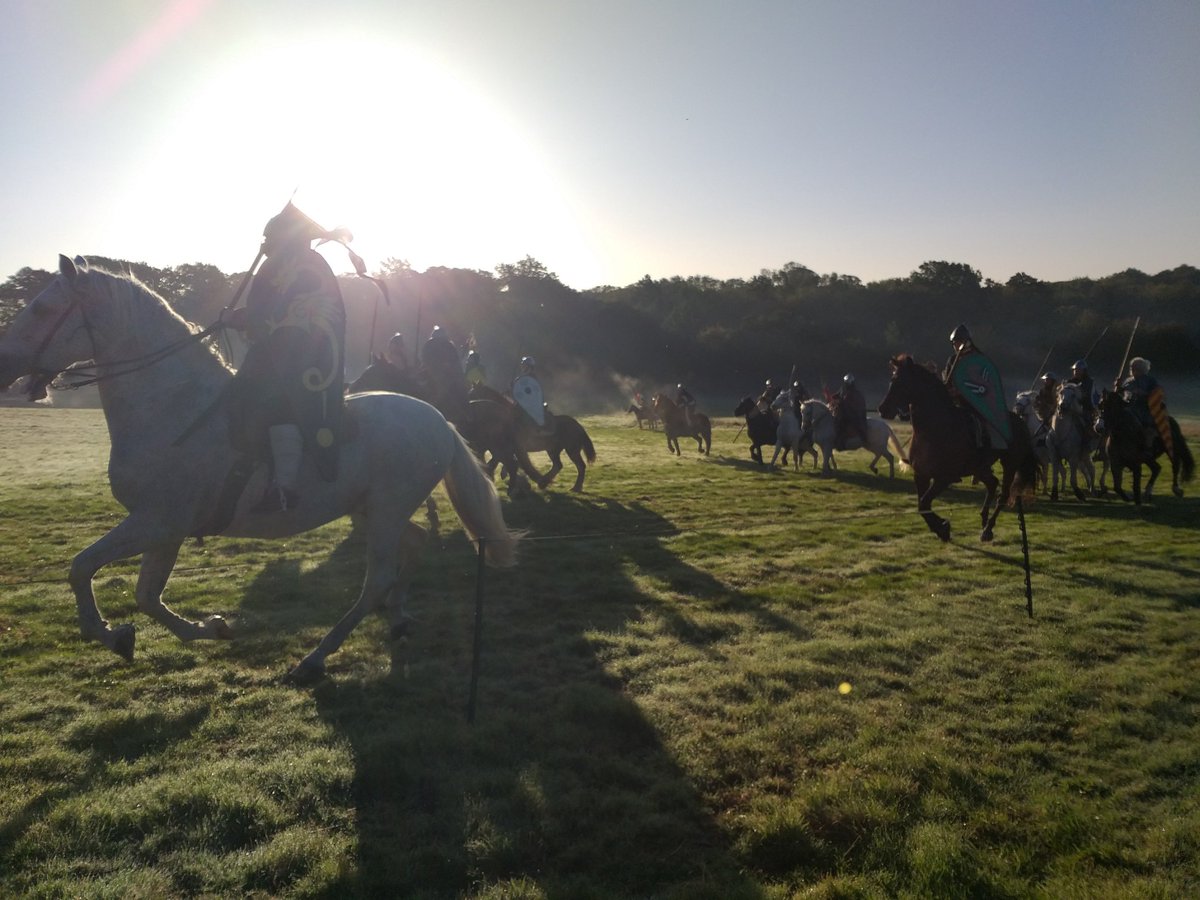 The Norman cavalry ride in the morning mist at the Battle of Hastings.