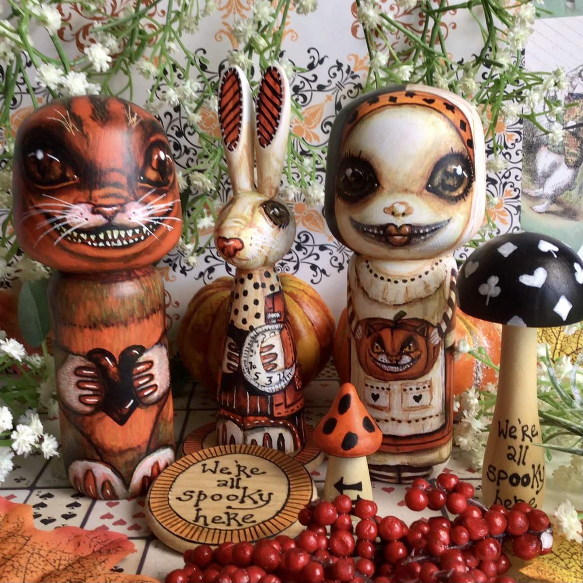 Both Alice and the rabbit have sold from my "We're All spooky Here" collection, just Cheshire left! He's clutching a black heart and has beautiful amber eyes, all the better to spook you with 🧡🖤🧡 #ukgiftam #aliceinwonderland #halloween allofalice.etsy.com/listing/152387…