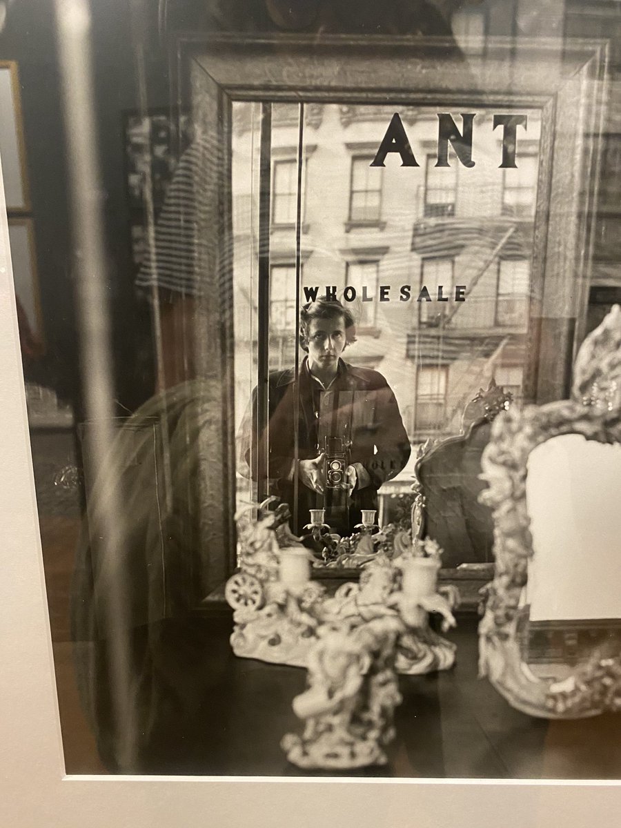 Reflections of #vivianmayer in a mirror. #selfportrait Our  presence in that particular place, at that particular time.