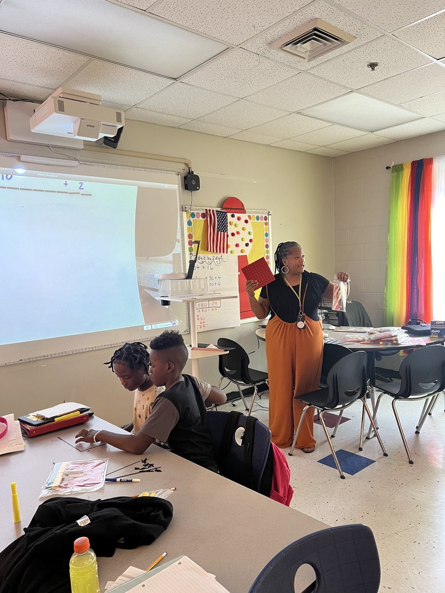 MrsShovely's tweet photo. Ya girl was in her bag introducing double digit multiplication with Base 10 blocks this week! Oh, and the kids had fun, too! I told them I’ll be back next week to drop some more gems on them 😝 #concrete #4thgrade #areamodel #base10 #mathisnotaspectatorsport @mack_benn https://t.co/SkyqQ4sVK9