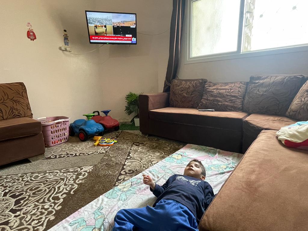 mck_beth's tweet photo. This is Iyas, 9, who lives at the Mubarat Al Rehmat children's centre in Gaza City. He is blind, non-verbal and has hypotonia. He and 26 other kids are trapped there with just 2 people caring for them. The director: "there is no safe passage and we can't move the children anyway" https://t.co/PKMwHhp5GU