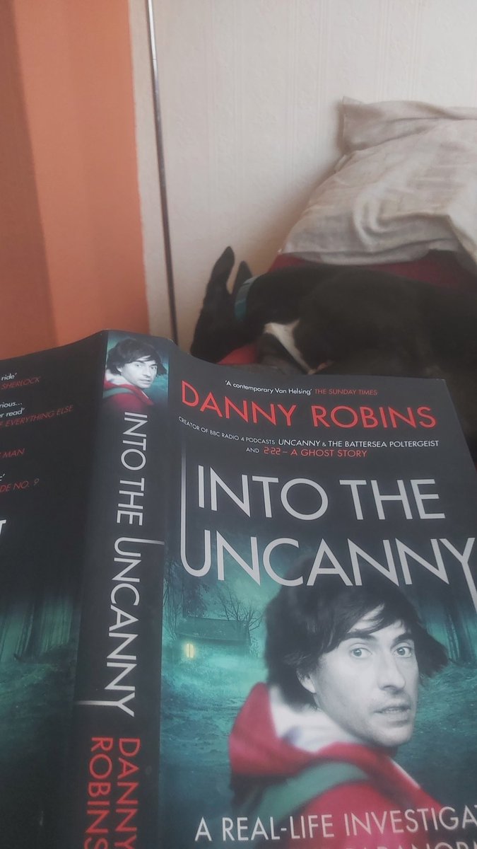 After the brilliant #UNCANNYTV last night, I'm now tucking in to further spooky goodness. Solo (the greyhound) not quite as impressed. Slept through the show and is now showing zero interest in the book! You can't please everyone @danny_robins