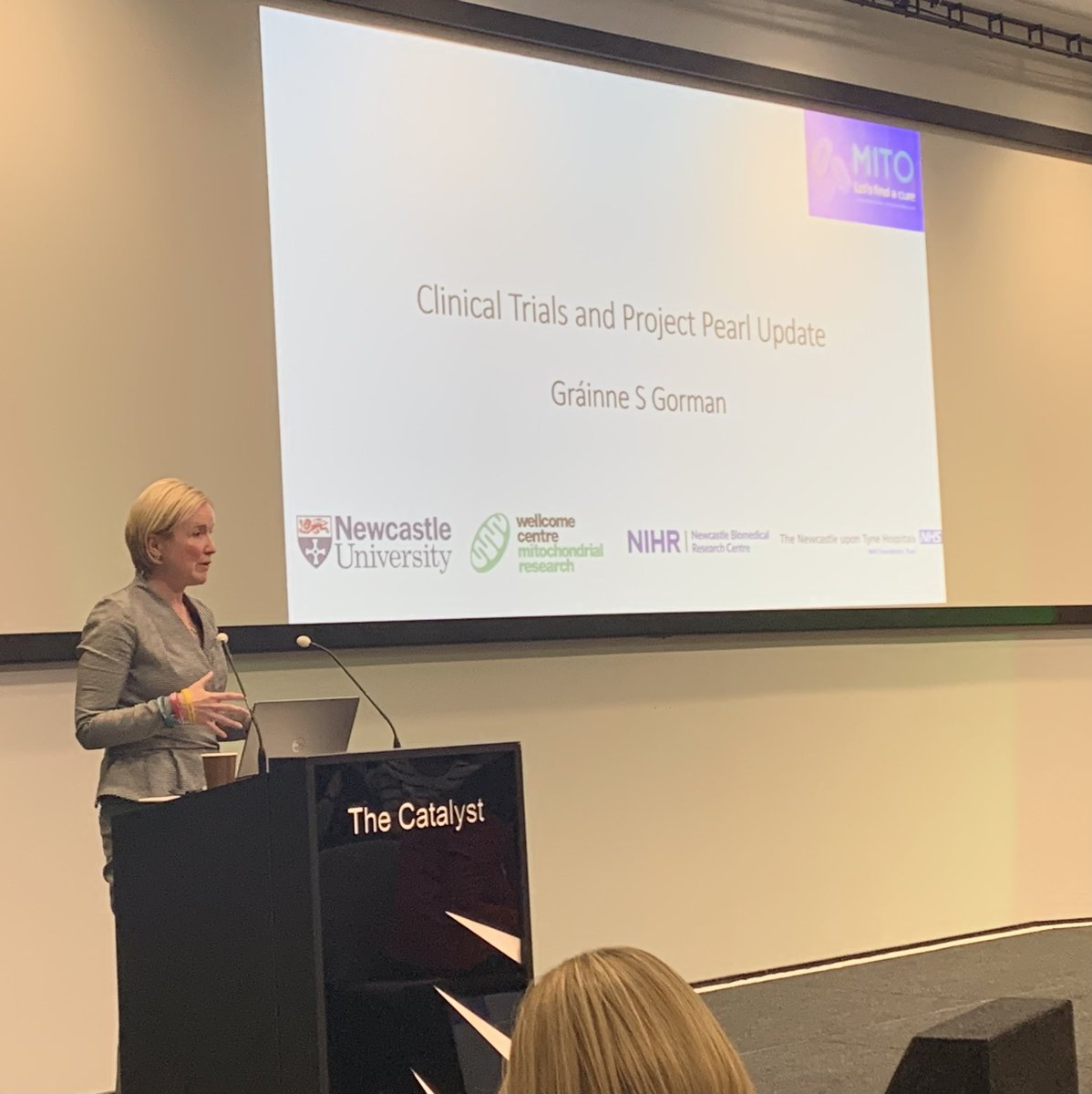 MitoResearch's tweet photo. Wellcome Centre for Mitochondrial Research Director Professor Grainne Gorman providing an update on our clinical trials (which are now in double figures) &amp; our awareness-raising activities as part of #projectpearl Thanks to all our patients &amp; families who make this possible 💚 https://t.co/ZiLyAKAuIi