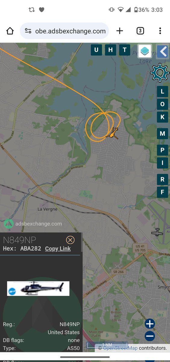 ScanNashville's tweet photo. Metro police air 1 helicopter overhead, suspect may be in woods or subdivision https://t.co/FF23ldtKgB