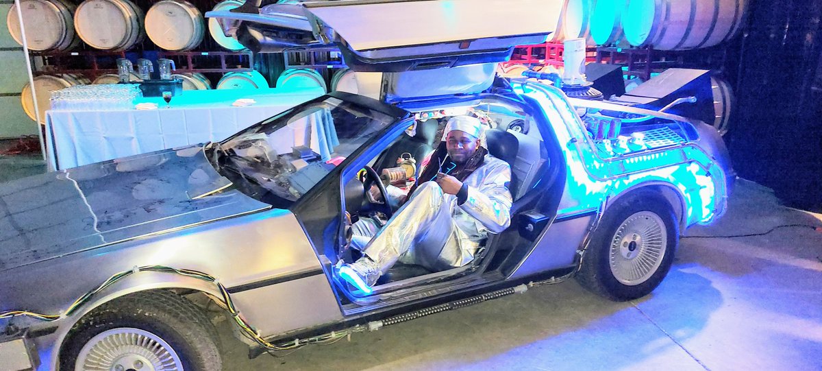 GoGoMewbari's tweet photo. Happy Back To The Future Day!
The Neko Esposo @peaceman74 was MC at a BTTF wedding a few yrs back. He was gonna go with a Marty McFly theme for his gear, but I said: "If you're leading the party... you need to be the DeLorean." https://t.co/pVC8yo3Zgm
