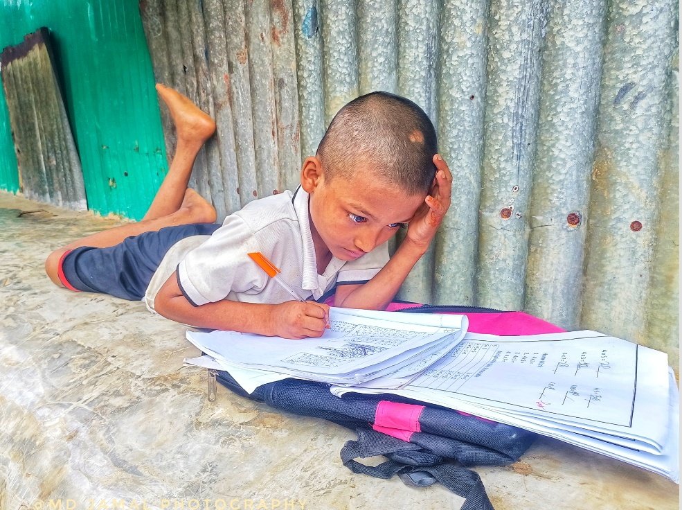 A Rohingya children is studying
 #Refugee Camp Cox's Bazar in Bangladesh #WorldMentalHealthDay
#RohingyaRefugees #Rohingyacrisis
#documentaryphotography #socialdocumentary #streetphotography #documentary #visualculture #life #dream #crisis #education #memory #artist
