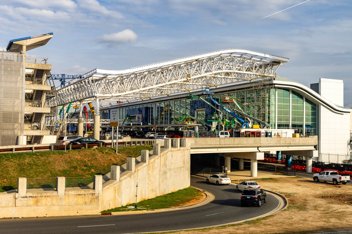 CLTAirport's tweet photo. 2022 → 2023 → 2024

A part of #DestinationCLT, this 146,000-square-foot canopy is comprised of 63 prefabricated steel truss pieces and 195 purlins that will support a glass canopy expected to be completed in 2024. It will shelter eight traffic lanes in front of the terminal. https://t.co/HAfrZr7Osa