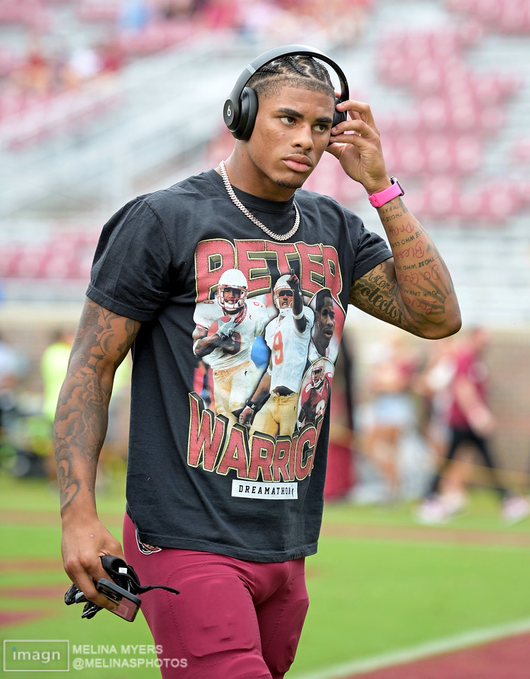 melinasphotos's tweet photo. FSU wide receiver Keon Coleman is warming up in a Peter Warrick T-Shirt today (Photo for USATSI). https://t.co/XNeasUKlYR
