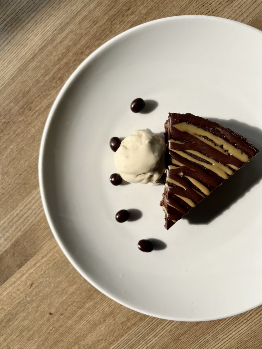 ThirdStSocial's tweet photo. Two local brands making life in KC sweeter!  Our flourless Chocolate Espresso Torte paired with #bettyraes Coffee Ice Cream is THE BEST way to celebrate National Dessert Day today! #nationaldessertday #eatlocalKC #localpartnership https://t.co/U7m10CAM9r