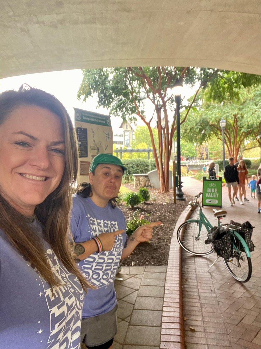BikeWalkGVL's tweet photo. Our Bike Valet for #FallforGreenville is all set up thanks to Jessica and Kat. Ride your bike and enjoy the event and meet our awesome volunteers today and Sunday under the Main Street Bridge on the SRT! https://t.co/Hxe0HHZo7H