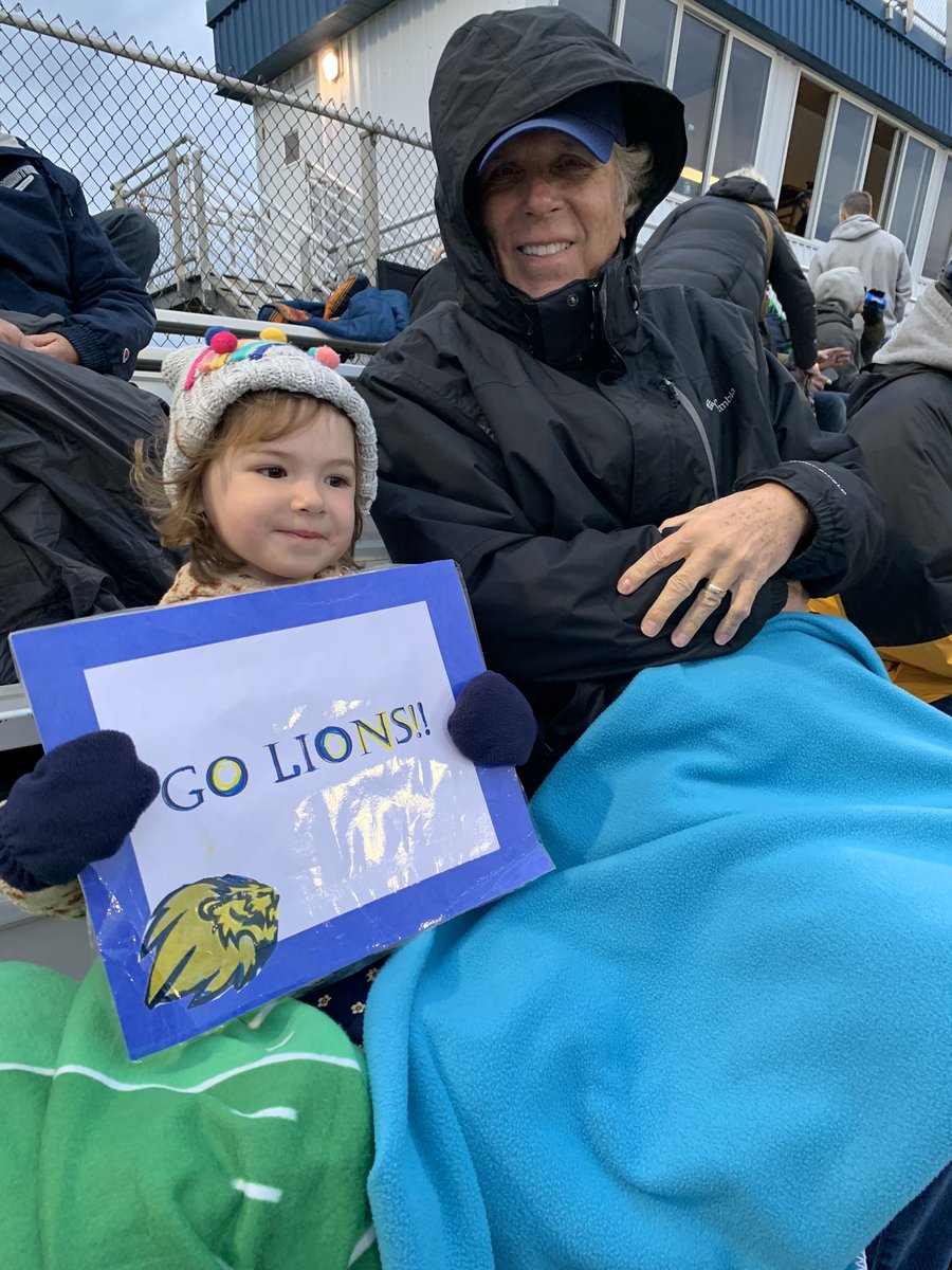 MsAlberty's tweet image. Josie and her grandpa cheering on  the football team at homecoming game !!! #southlyon