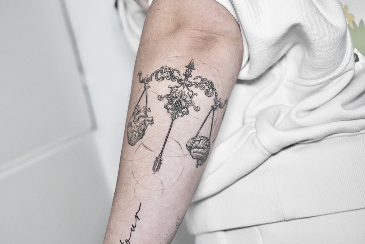 StatueKain's tweet photo. Healed scale on Matilda’s forearm #libratattoo https://t.co/rAjjKKB3qi