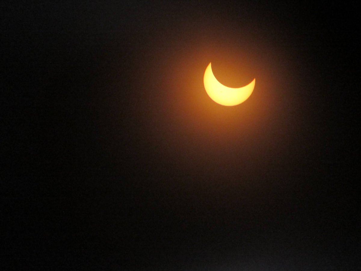 Eclipse is in progress!  Max eclipse coming up at 11:58am in Houston. #SolarEclipse
