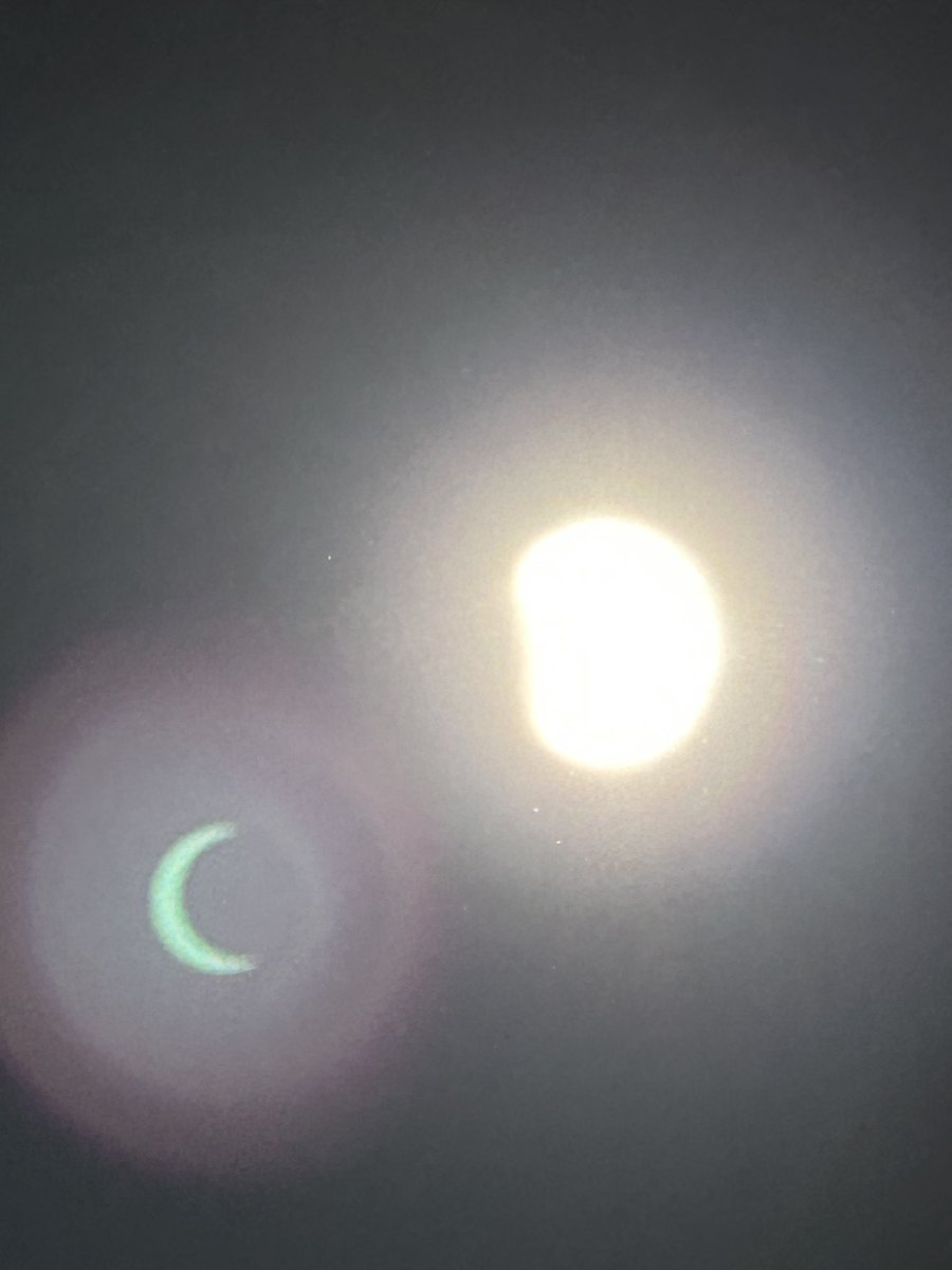 The 2023 Annular Eclipse in #LasVegas  The reflection of the sun on the bottom left is, amazingly, capturing how covered the sun truly was here while the sun itself is only partially obscured.  #RingofFire