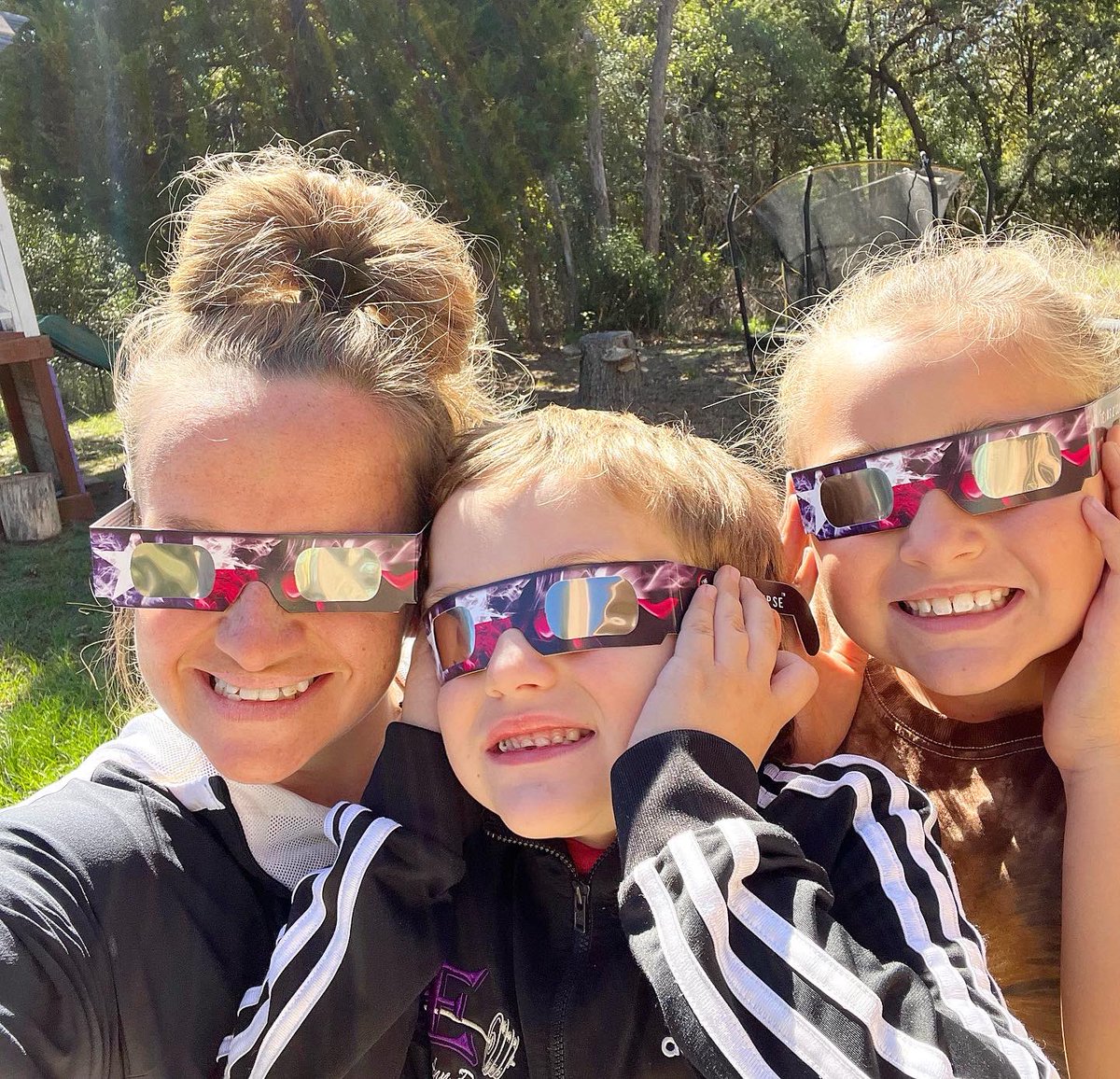 CharlyRowe4's tweet photo. Had front row seats for the “ring of fire” annular solar eclipse today and I loved anticipating and watching it with these kiddos!
We took a pair of eclipse glasses to daddy @rowe_coach so he could watch it too!
#RoweLifeIsTheBestLife #RingOfFireEclipse #AnnularSolarEclipse https://t.co/kZyYUKhliE