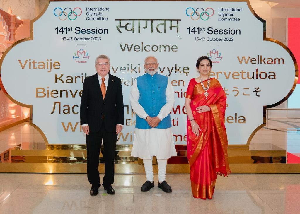 IndSuperLeague's tweet photo. The 1️⃣4️⃣1️⃣st IOC Session was officially inaugurated today by Shri Narendra Modi, in the presence of Mrs. Nita Ambani and Mr Thomas Bach
#IOCatNMACC #Olympics #NarendraModi #IOCSession #RelianceFoundation #NitaAmbani #IOC #RFwithOVEP #Olympics #NMACCIndia | @nmacc_india https://t.co/cmivYPYfuQ
