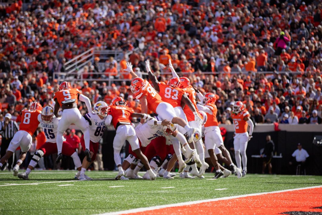 okstate's tweet photo. Brought the #OrangePower! 

Cowboys win! #GoPokes https://t.co/GuzP7fCpUo