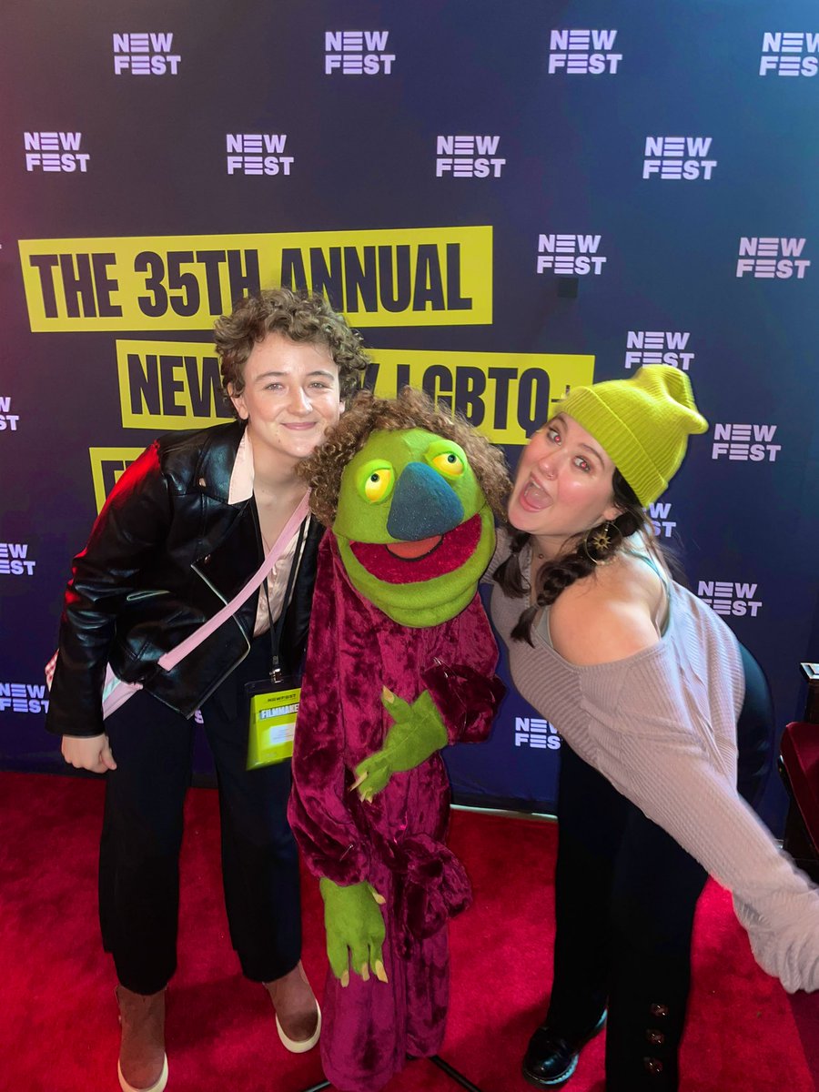 MaddyOldham's tweet photo. seeing your friend’s film at a festival: 🤩

the puppet from their film doing photo ops after the showing in their own premiere outfit: 😋🥳🤠🥰😇 https://t.co/o5hqMPioXu