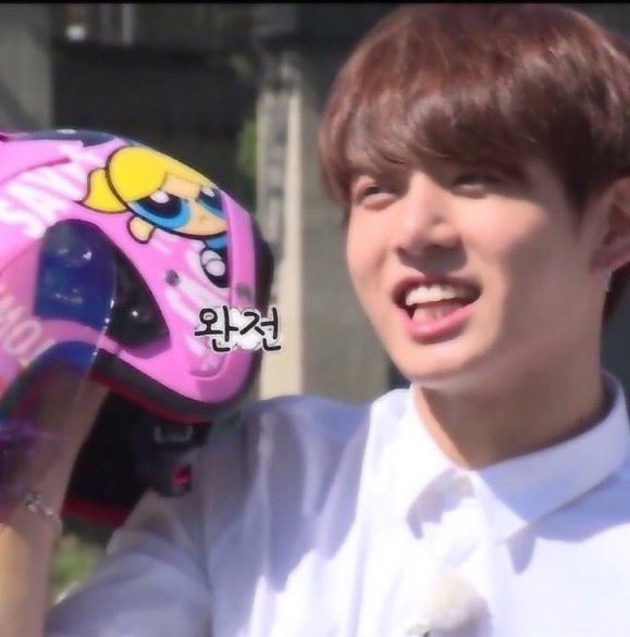 koogifs's tweet photo. jungkook wearing a powerpuff girls helmet https://t.co/0al0ue5FXN