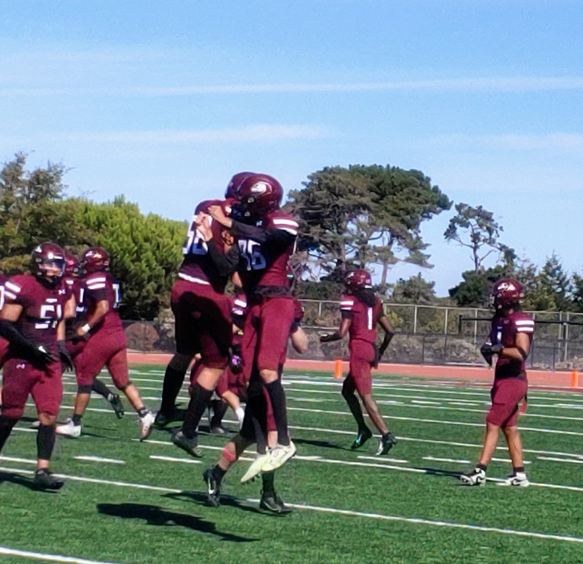 Ricky Weiner celebrates his run for a first down on a fake punt for MPC