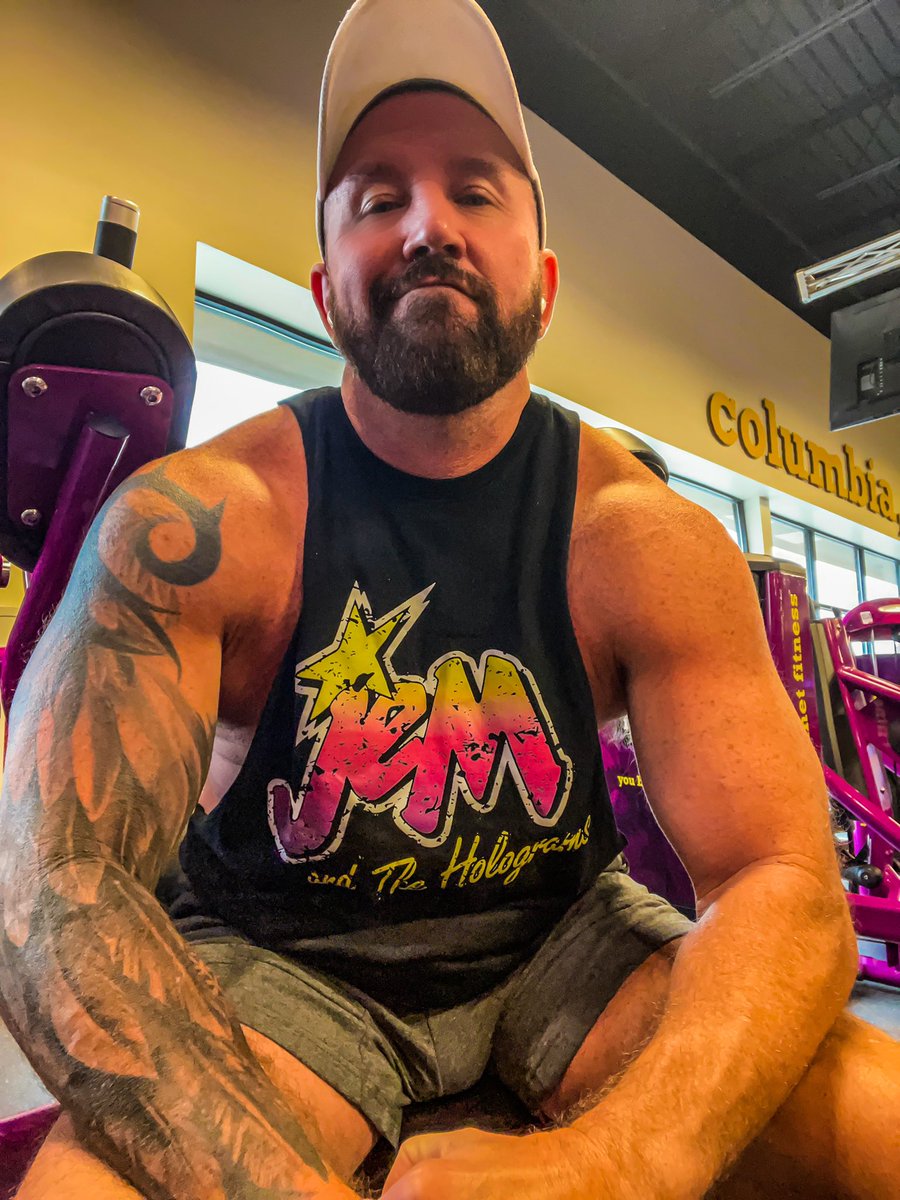 TomBoySC's tweet image. It takes a real badass to live a duel life as a record company executive and a lead singer of a world famous rock band while also running a girls orphanage and constantly fighting with the Misfitz! It’s showtime synergy! Barbie who?  #jemandtheholograms #tattoo #bearded #workout