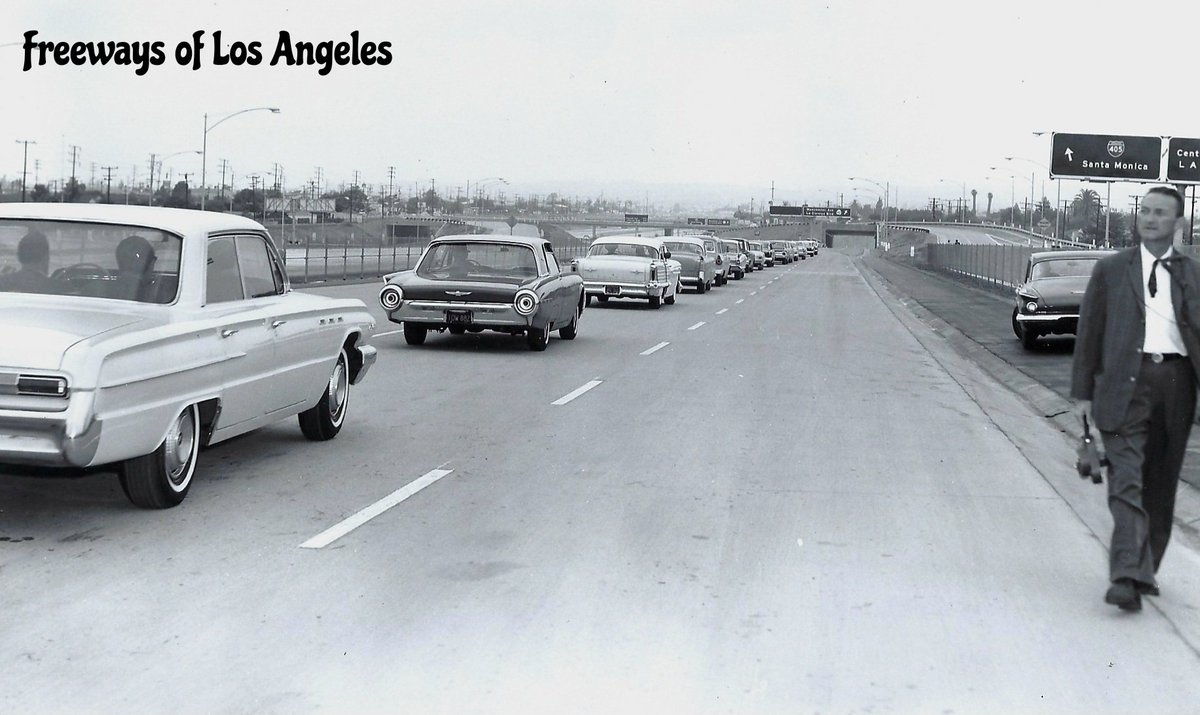 1963-May-28 - NB San Diego Fwy (I-405) opening procession at Century Blvd/LAX collector road exit. Manchester Ave (CA-42) exit in distant background (DOH D7 Archives photo).