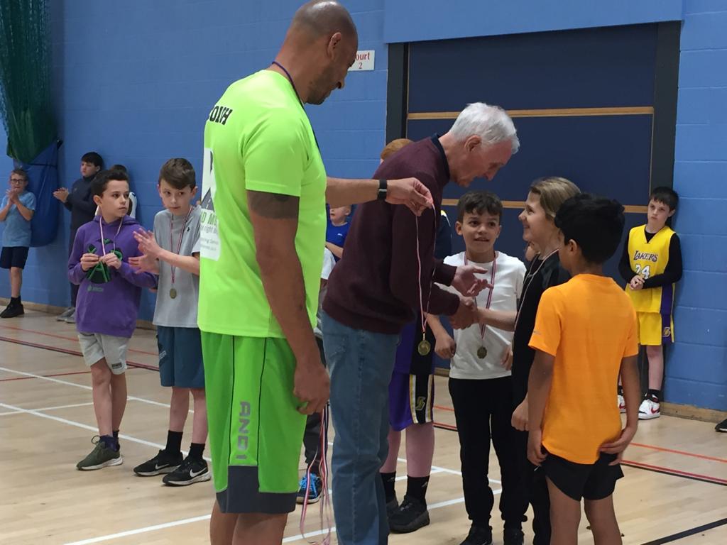 MindMovesUK's tweet photo. Mind Moves, Healthy Hoops Basketball in full swing. Participants receiving their medals from the legendary 'Reg Allen' 
Funded by @Sport_England supported by @MindMovesUK and @VolairLeisure https://t.co/iUb8aAmHpW