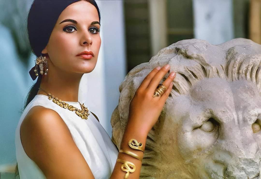 archeohistories's tweet photo. In 1966, Greek actress Élena Nathanaél posed for Paris Match Magazine. 

She stands next to the Lion of Kerameikos and she wears pieces of ancient jewellery, such as the "Necklace of Troy" and the "Gold bracelets with Snakes" from Stathatos Collection of the National Archaeological Museum in Athens. 

The photoshoot was done in the atrium of the National Archaeological Museum in Athens by the acclaimed photographer Jack Garofalo.

This was the first and last time the National Archaeological Museum allowed a model/actress to wear some of the ancient jewelry of the collection.

© Hellenic Archives

- Subscribe for Weekly Newsletter -
https://t.co/QSjn4yGpeh

#archaeohistories