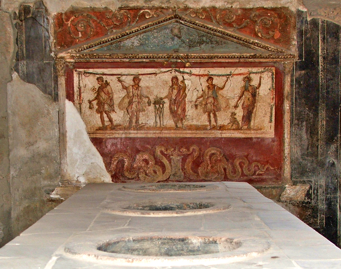 TrimontiumTrust's tweet photo. Thermopolia were found throughout the #Roman Empire. Food and drink was kept in earthenware jars embedded in the holes in the counter, helping to keep them warm.  The food they served was designed to be eaten on the move https://t.co/Lfv3yfsqWx