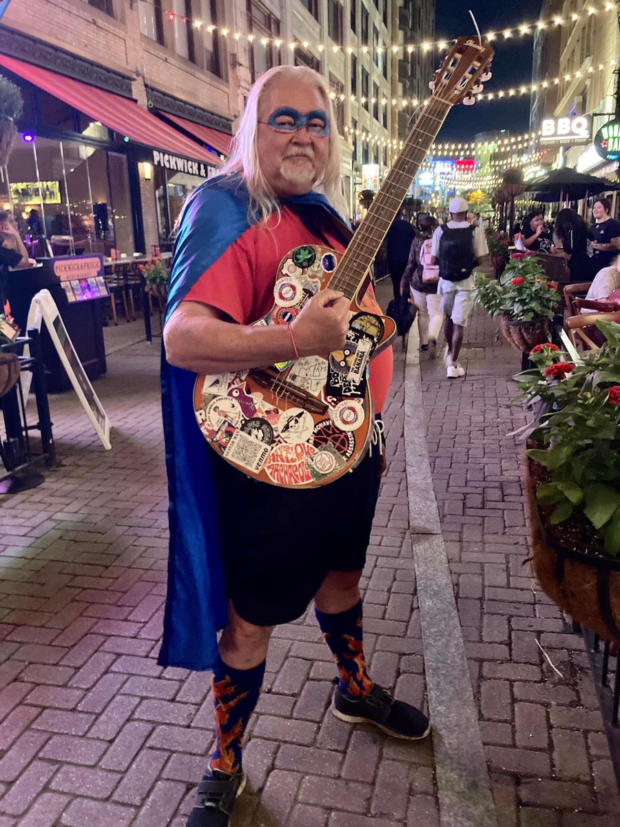 It was a thrill to meet the one-and-only Guitar Man on @e4thst in @DowntownCLE The superhero alter ego of native Clevelander Eli Fletcher, Guitar Man delights local crowds and passersby with musical offerings created on his acoustic Ibanez guitar.