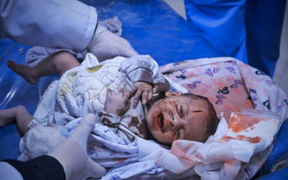 QudsNen's tweet photo. Israel killed 1,000 Palestinian children, including 320 babies, in 9 days. https://t.co/8XWDkySJJ6