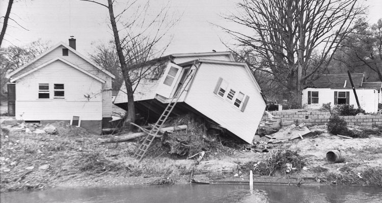 CraigBaird's tweet photo. Today in 1954, Hurricane Hazel hit Toronto, becoming the worst natural disaster in the city's history. 

The hurricane was first identified on Oct. 5, 1954 off the coast of Grenada. 
At 4:30 p.m. on Oct. 15, the hurricane began to dump heavy rain on Toronto.
At 7 p.m. there was a brief pause but it was not the eye, only a break before a true deluge began.

Heavy winds soon slammed into the city, coupled with torrential rain. The area around the Humber River had been deforested so water quickly flowed into the river causing it to flood.

Water levels rose by as much as six to eight metres during the storm.
Highway 400 was under three metres of water in some places near Bradford, Ontario.

At 11 p.m., the first death was reported when a car was swept into the Humber River, killing all the occupants. 
As the flooding increased, passenger trains were knocked off their tracks and 40 bridges were destroyed or severely damaged. 

At Woodbridge, the Humber River swelled to 107 metres in size at a narrow point, killing nine people and leaving hundreds homeless. 

The hurricane dropped 214 mm of rain in Snelgrove, Ontario, including 90 mm in three hours.

A total of 81 people died, 30 of which were killed on Raymore Drive when the flooding river tore homes from their foundations. The homes were swept downstream. It also destroyed 366 metres of road in that area.

Two men, off-duty police officer Jim Crawford and building contractor Herb Jones, used a small boat to rescue 50 people through the night. 

Over 800 soldiers were sent to Toronto to assist with cleanup and providing items for homeless residents. 

After the hurricane, conservation authorities, municipalities and the province worked together to develop a plan for flood control and water conservation. 
Large dams, reservoirs and flood control channels were built.

Regulations were also enacted to restrict developments in flood plains, so rivers could flow naturally. 

If you enjoy my Canadian history content, you can support my efforts with a donation at https://t.co/u12Dmz8vKv

Sources:
https://t.co/o4lyK82tO4
https://t.co/kNuggp69Ox