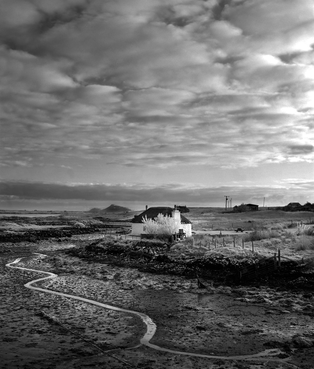 Ronald's Cottage, Isle of South Uist, Scotland.

▪️ Horseman 45 FA & SK 150mm F5.6
▪️ Rollei IR 400 + R72 + Red filter
▪️ F22 / 4 secs & HC110B for 6 minutes

#believeinfilm #blackandwhitephotography #LargeFormatPhotography #4x5 

@UistArts