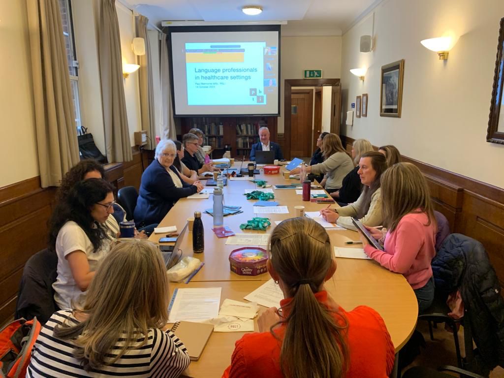 ALSLips's tweet photo. A snapshot of our excellent training/AGM day. @ALSLips members in person &amp; on screen as @paulbelmontesli delivers his training. DianD #docom @JacobsenYasmin managing the remote attendees, Bridget lipspeaking for ambassador @_timreedy #HybridTraining #TeamWork #CollegialFellowship https://t.co/UYKmxHBl20
