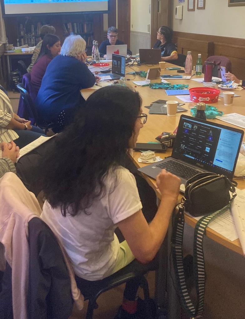 ALSLips's tweet photo. A snapshot of our excellent training/AGM day. @ALSLips members in person &amp; on screen as @paulbelmontesli delivers his training. DianD #docom @JacobsenYasmin managing the remote attendees, Bridget lipspeaking for ambassador @_timreedy #HybridTraining #TeamWork #CollegialFellowship https://t.co/UYKmxHBl20