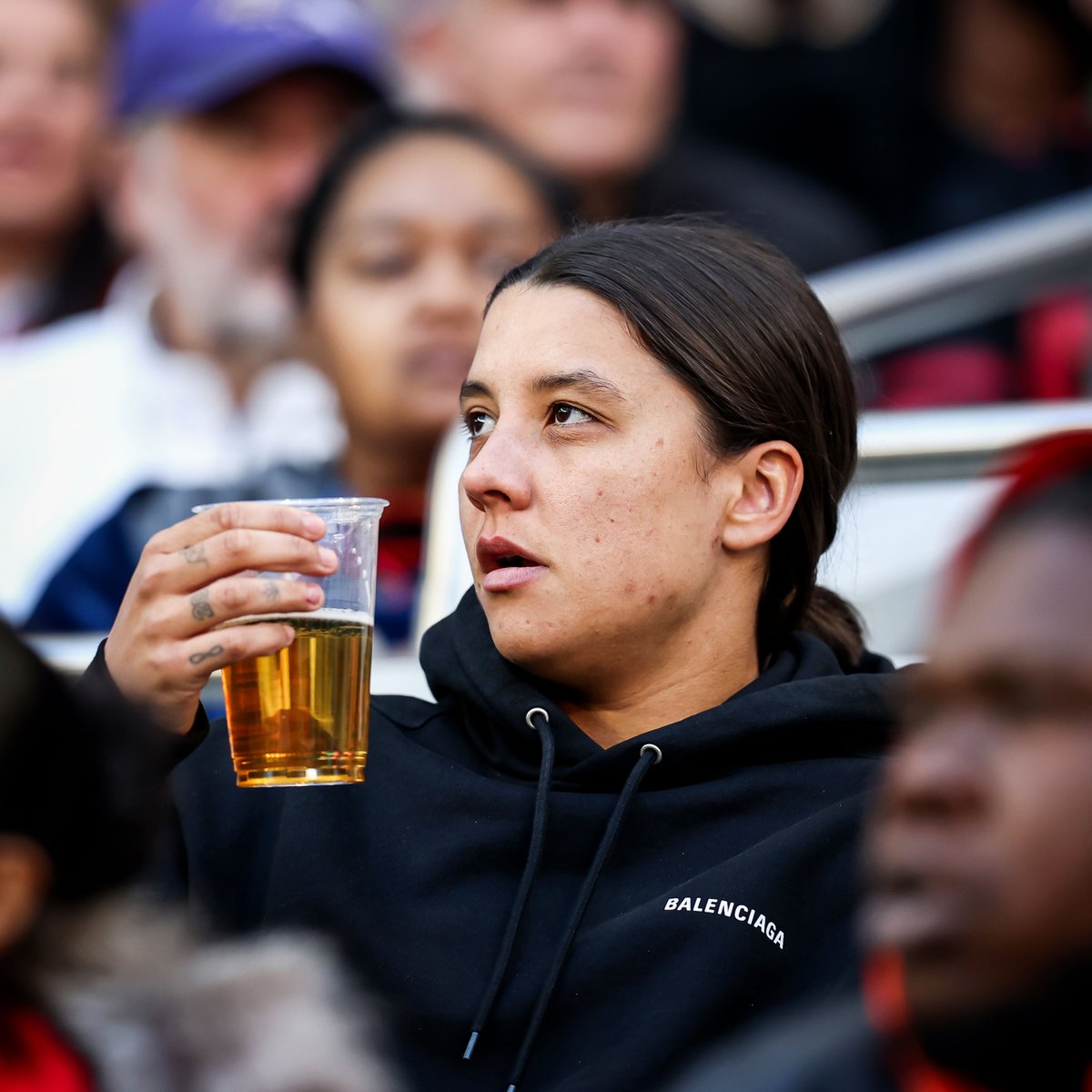 Sam Kerr taking in the NFL London game between the Ravens and the Titans 🍺