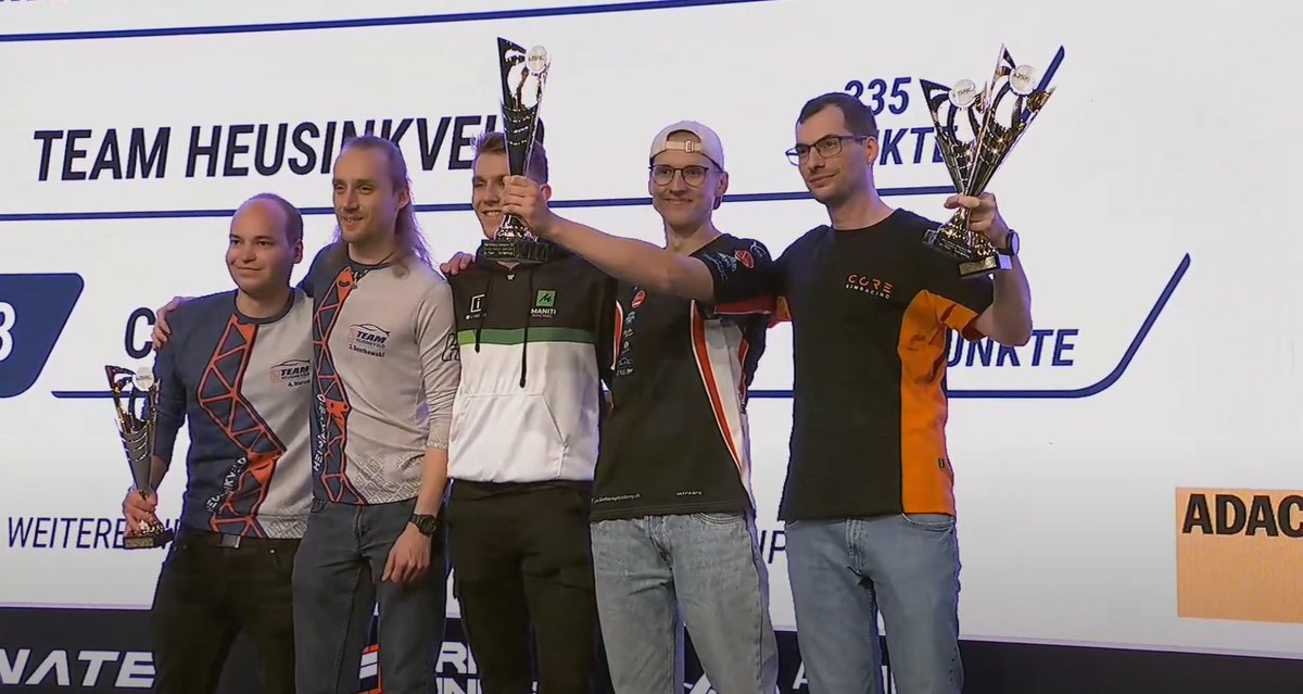 CoReSimRacing's tweet photo. @SimRacingExpo | Thanks 👏 for the lovely stage ceremony 🏆🏆🏆 for the 2023 #dmsb #dsrc podium results of last week! 🇩🇪 @CaliWinkler receiving the #adac #dmsb #endurance (P1 GT3) &amp; #sprint (2x P3) trophies!🏁#adac #iracing #gt3 #champions #ADACSimRacingExpo2023 https://t.co/YpelezaGcx