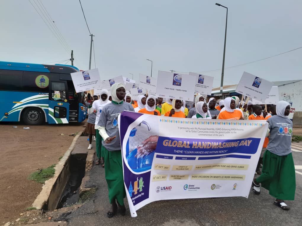 GCommunitiesGH's tweet photo. Celebrating #GlobalHandwashingDay with a Splash of Awareness! Thrilled to see our selected Basic Schools in Wa marching, spreading the vital handwashing message! Hand hygiene is crucial; these young champions are leading the way!  🤲💦 #CleanHandsAreWithinReach @HandwashingSoap https://t.co/q0bEdn9ejS