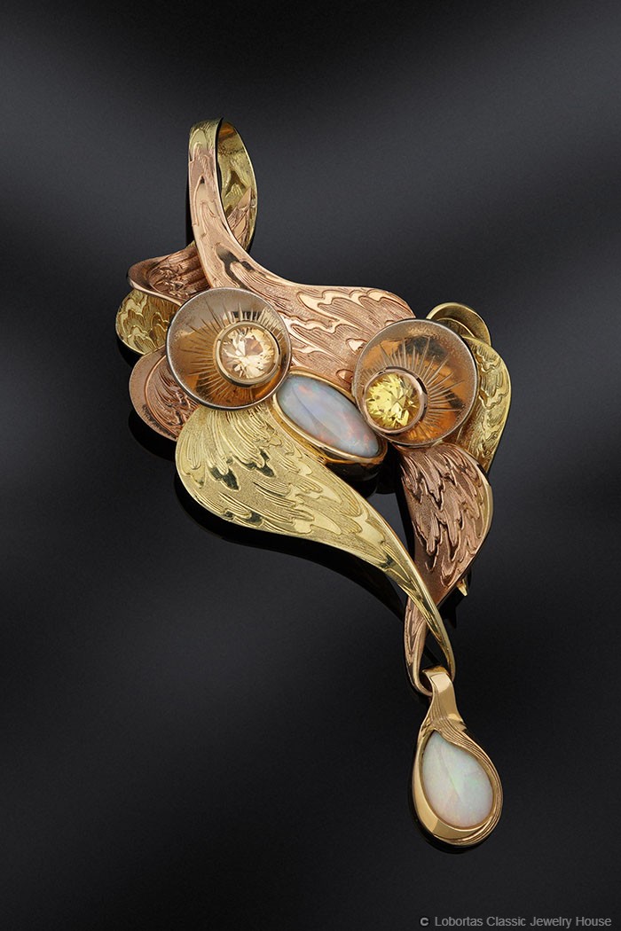 Lobortas's tweet photo. Add a #MYSTERY to your look with this sculptural yellow #gold #pendant decorated with yellow #sapphires and #opal. https://t.co/w0ycQGRt1o https://t.co/efJE274KGh
