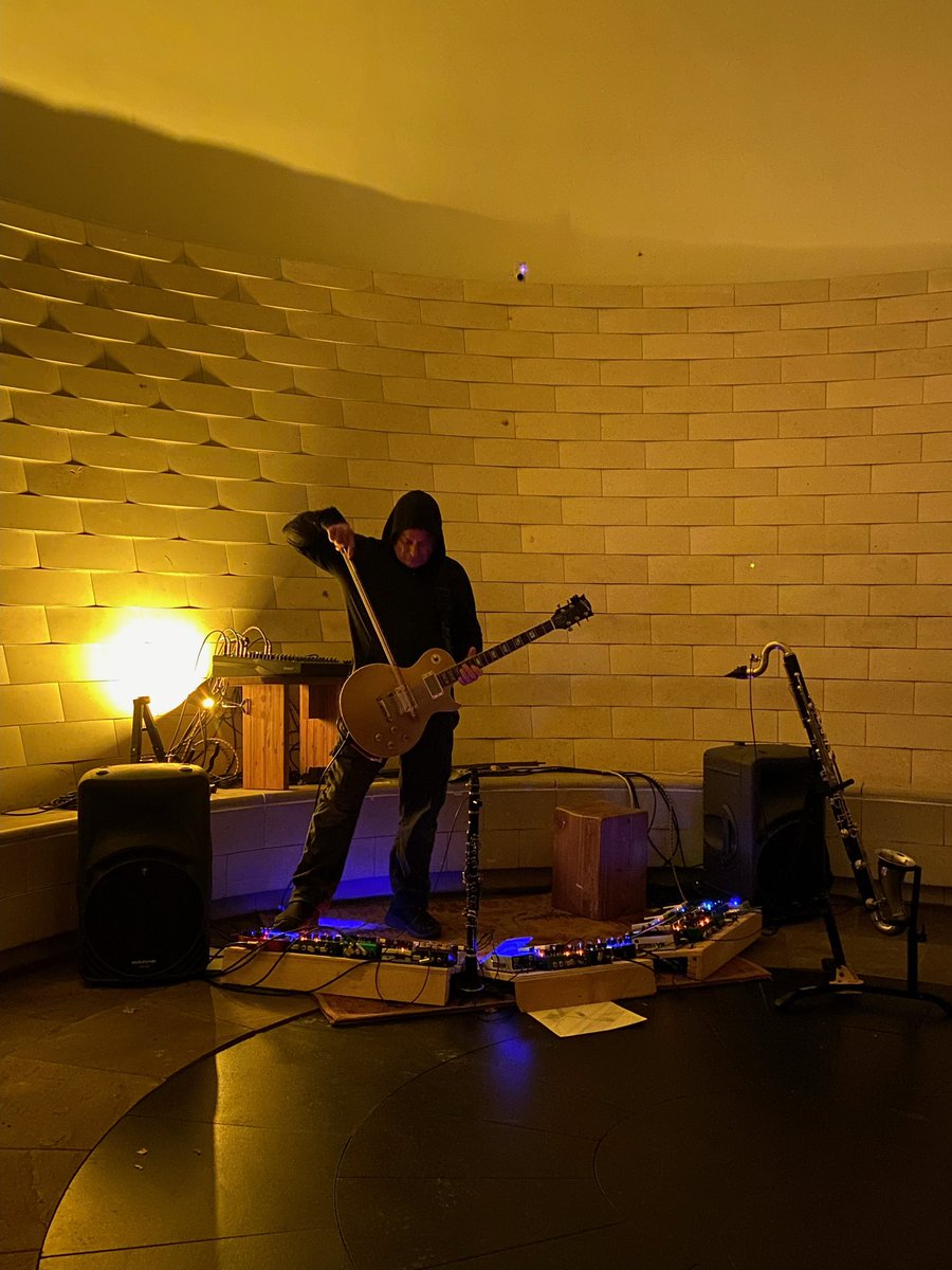 CraigColorusso's tweet image. Bowed guitar in the Skyspace at @crystalbridges part of Art Trail at Night: Glow Party photo by @keely_brice