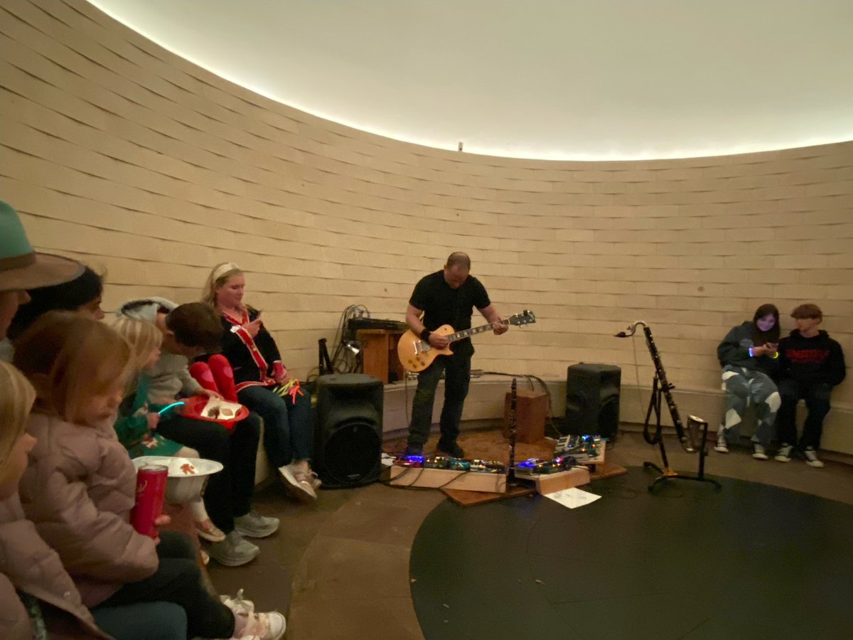 CraigColorusso's tweet image. Bowed guitar in the Skyspace at @crystalbridges part of Art Trail at Night: Glow Party photo by @keely_brice