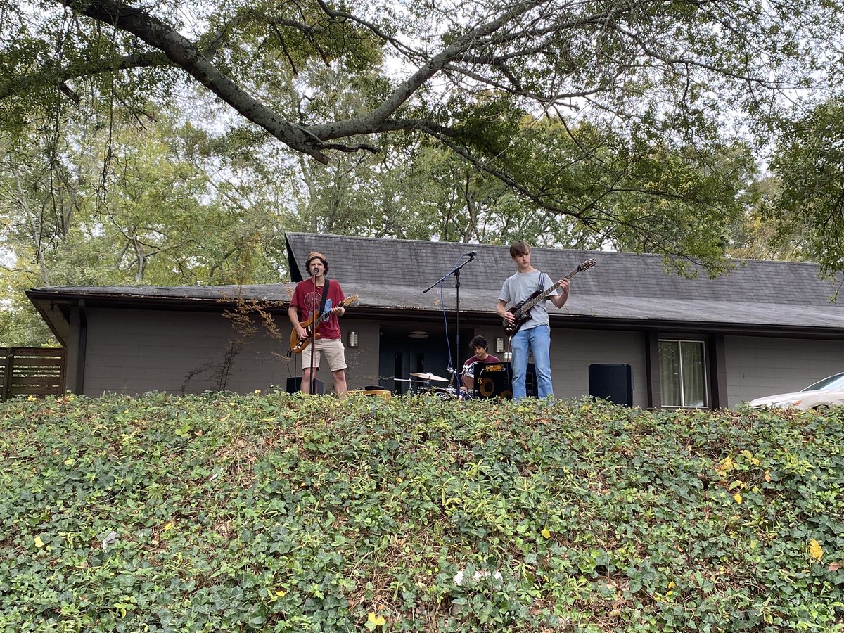 @HistoricAthens Porchfest is underway. Athens indie-jam-funk-rock band Mars Hill, one of over 200 performers today, plays to a crowd from a porch in the historic Boulevard neighborhood. (Photo/Brigette Ramirez) #HistoricAthensPorchfest