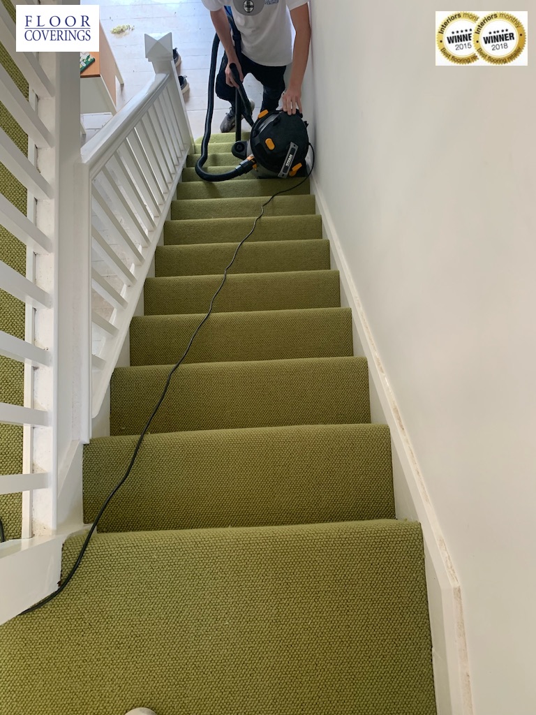 A lovely green 100% wool loop carpet installation on landing and stairs here. We have such great fitters and yes we always tidy up after ourselves!  We're quite handy with a hoover! #flooring #carpet #home #stairs