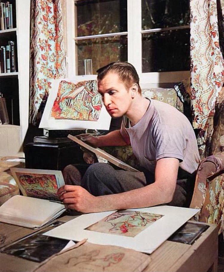 Vincent Price working on his art collection (1944)