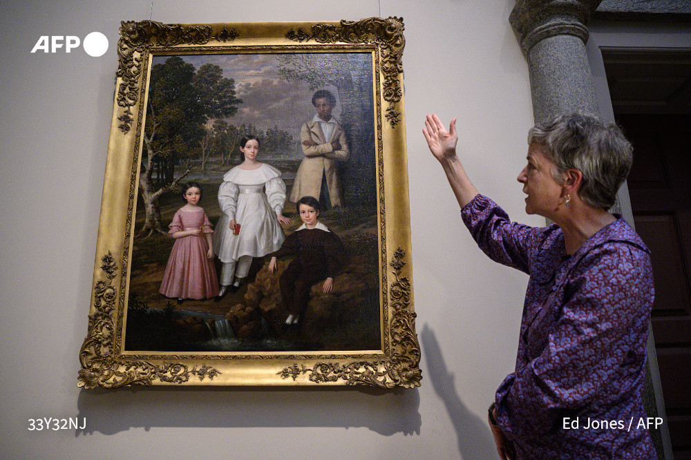 AFP News Agency (@afp) on Twitter photo For years, the children from a well-to-do New Orleans family seemed to be the only figures in a painting attributed to French artist Jacques Amans.
The family's slave, Belizaire, had been painted over - erased. His image has been restored.
u.afp.com/5ZtM by <a href="/A_Bambino/">Andrea Bambino</a> For years, the children from a well-to-do New Orleans family seemed to be the only figures in a painting attributed to French artist Jacques Amans.
The family's slave, Belizaire, had been painted over - erased. His image has been restored.
u.afp.com/5ZtM by <a href="/A_Bambino/">Andrea Bambino</a>