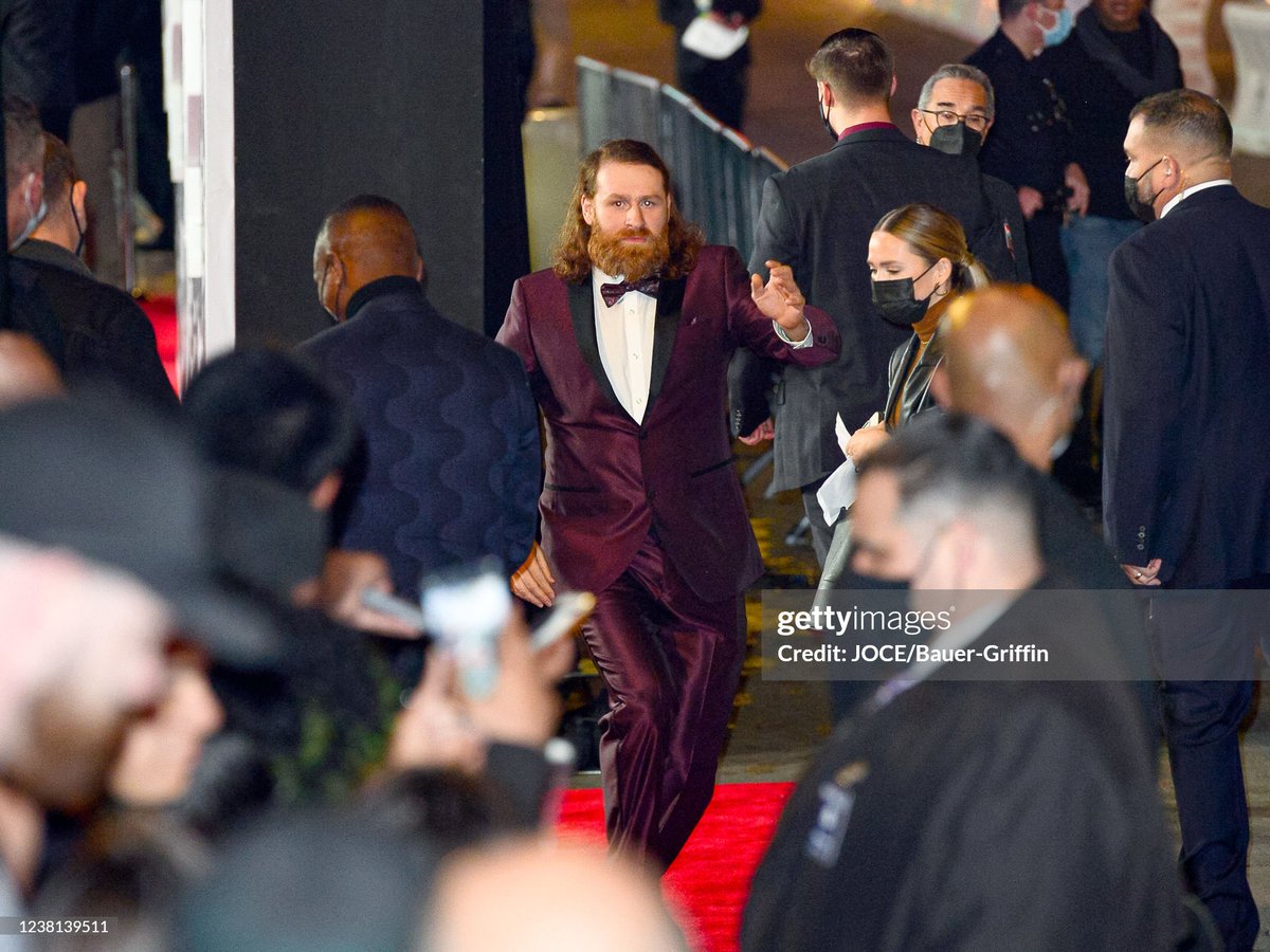 FightPromoting's tweet image. Sami Zayn is seen wearing a purple tuxedo outside TCL Chinese Theatre on February 01, 2022 for the U.S. premier of Jackass Forever