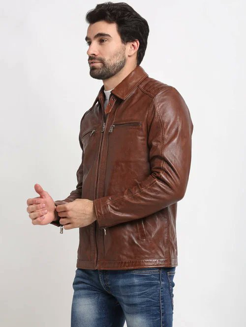 A leather shirts adds an edge to any look. Are you ready to rock it? #LeatherShirt #FashionForward #StyleIcon #LeatherChic #WardrobeGoals #LeatherLuxe