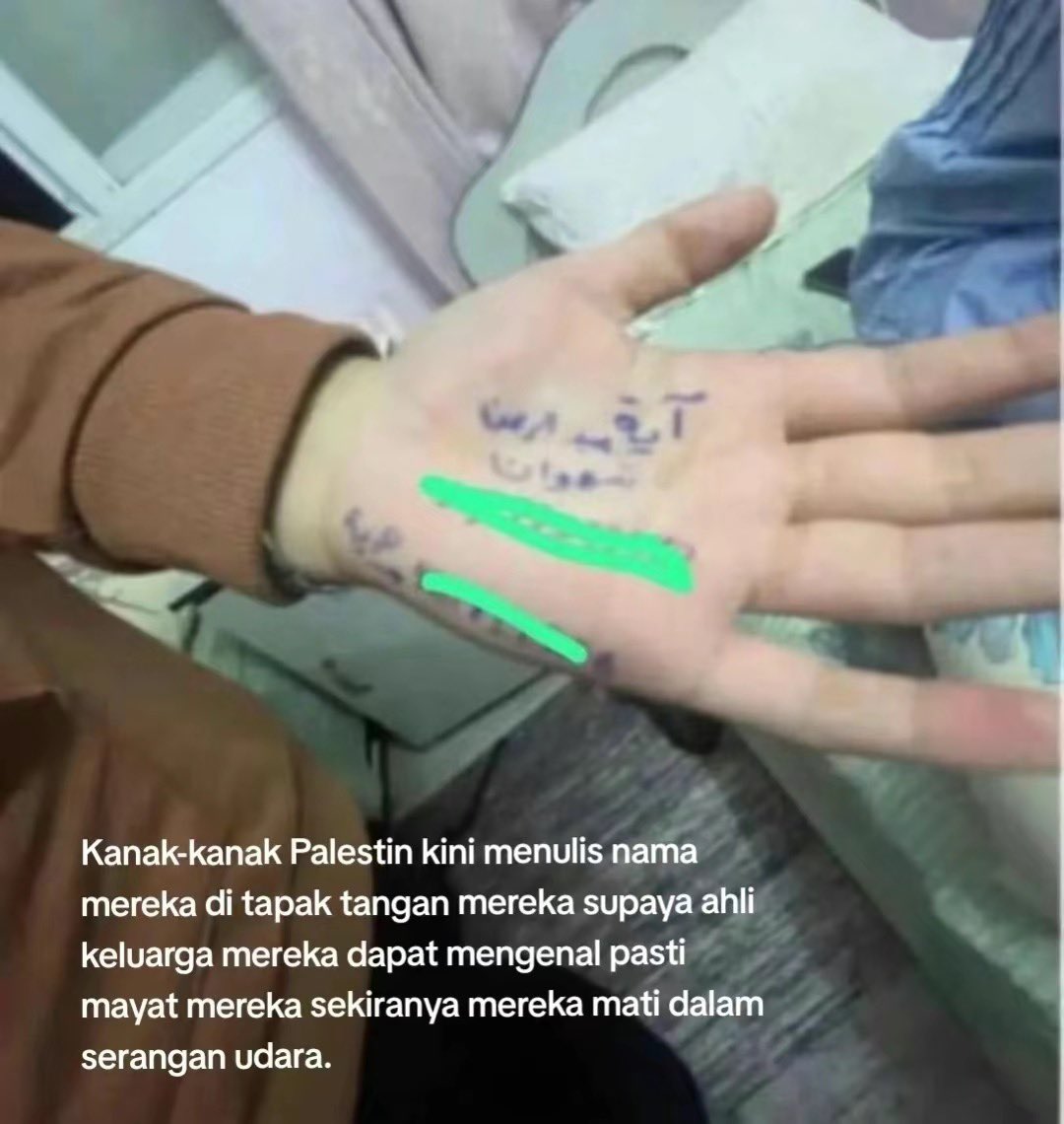 Palestinian children now write their names on their palms so their family members can identify their bodies if they die in an airstrike #SavePalestineSaveHumanity #SaveGaza #war #isnotreal