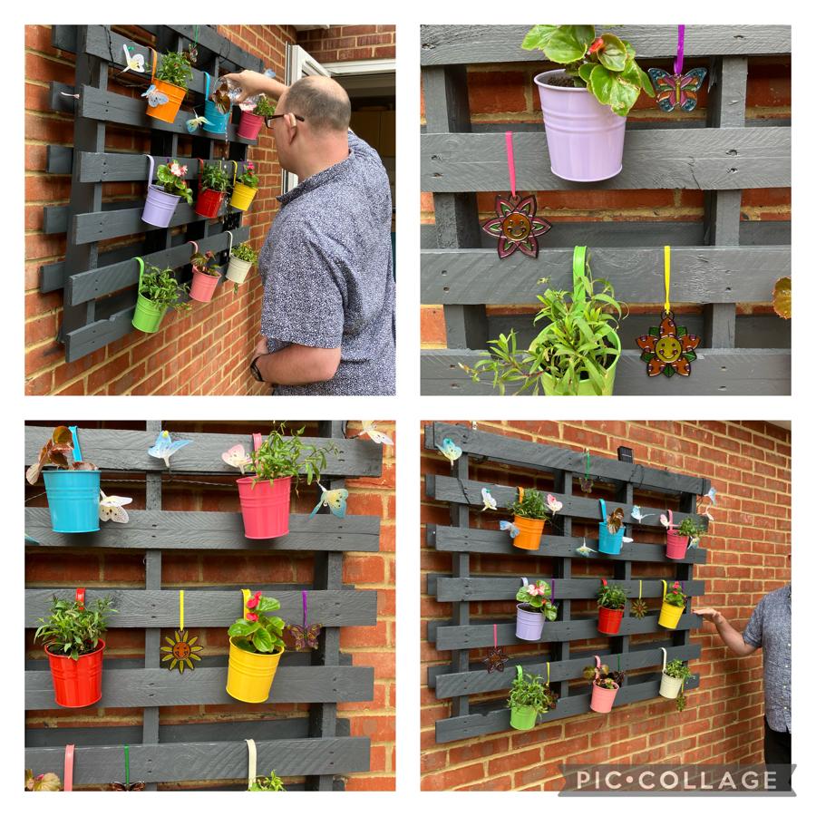 The Wayfield hanging pot garden! A joint effort from residents, with one on ‘rubbing down & painting the palette’ duty & others planting up the pots & being responsible for watering them. A great team effort! #TheKentAutisticTrust #autismawareness #autism #support #potplants